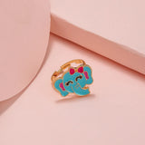 Bague fille avec anneau doré réglable et motif éléphant bleu.
