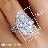 Bague grosse pierre pour femme en argent sterling avec les dimensions de la moissanite ovale.