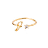 Bague initiale J en acier inoxydable couleur doré.