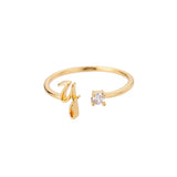 Bague initiale Y en acier inoxydable couleur doré.