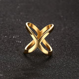 Bague large femme en acier doré avec un design de X