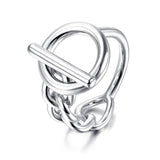 Bague originale en acier couleur argenté avec un anneau en chaîne et un grand cerle.