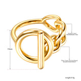 Bague originale en acier doré avec ses dimensions et les informations sur son matériau.