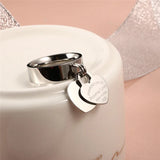 Bague pampille argentée avec deux coeurs, faite en acier inoxydable.