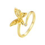 Bague papillon dorée en argent sterling 925 avec une petite pierre.
