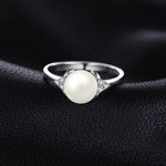 Bague perle en argent sterling avec perle d'eau douce blanche ronde.