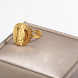 Bague pièce en acier inoxydable de couleur doré à taille réglable.