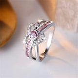 Bague saint valentin en acier inoxydable argenté pavé de zircones roses et blanches.