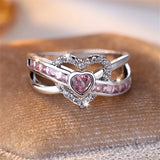 Bague saint valentin double coeur et double anneau, avec des strass blancs et roses.
