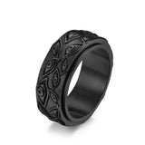 Bague vintage noire en acier inoxydable avec des yeux sur l'anneau.