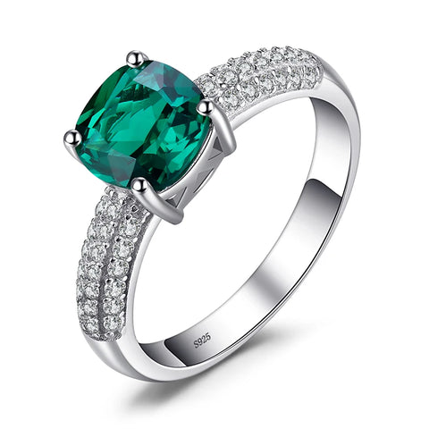 Bague émeraude arificielle avec un anneau en argent 925 pavé de pierres.