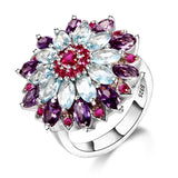 Grosse bague argent femme originale en argent sterling avec des pierres colorées formant une grosse fleur.