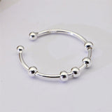 Bague anti stress en argent sterling 925 avec 5 perles rotatives et glissantes.